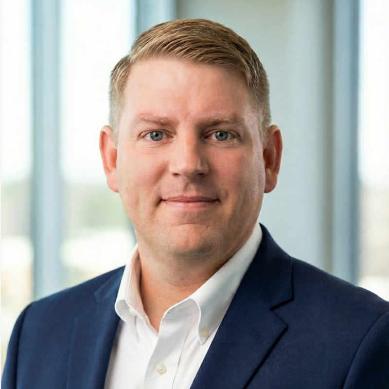 Preston Willis wearing a navy suit jacket